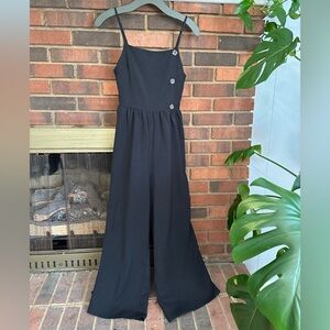 🛍️ Joah black spaghetti jumpsuit with excellent condition.
